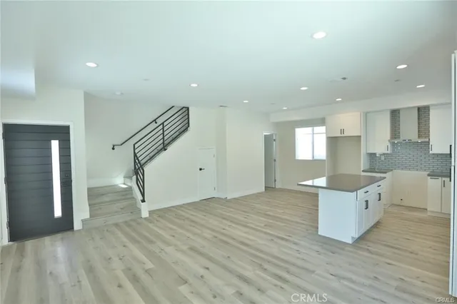 a view of kitchen and wooden floor