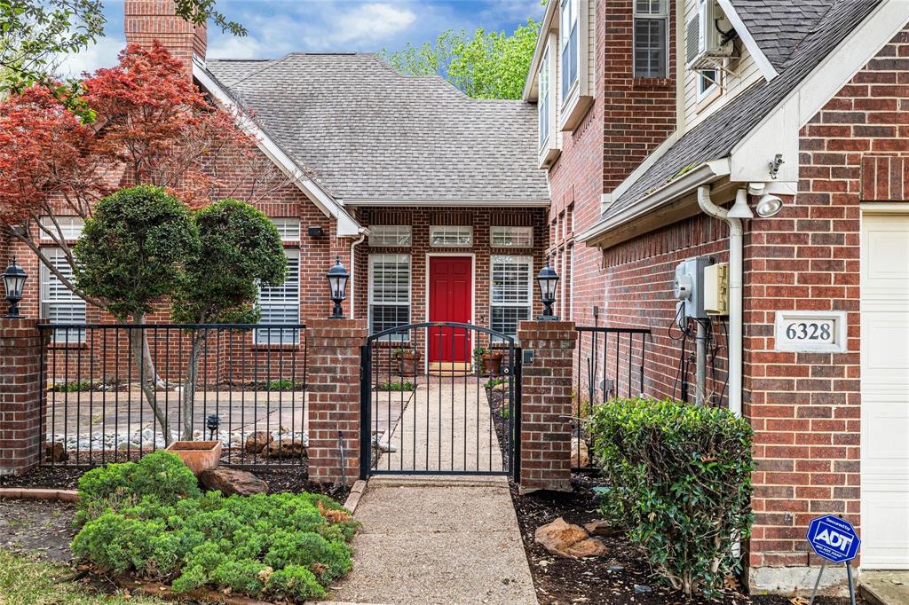 6328 Park Meadow Lane Plano, TX 75093 - Photo 1 of 1 a view of a house with a small yard and plants