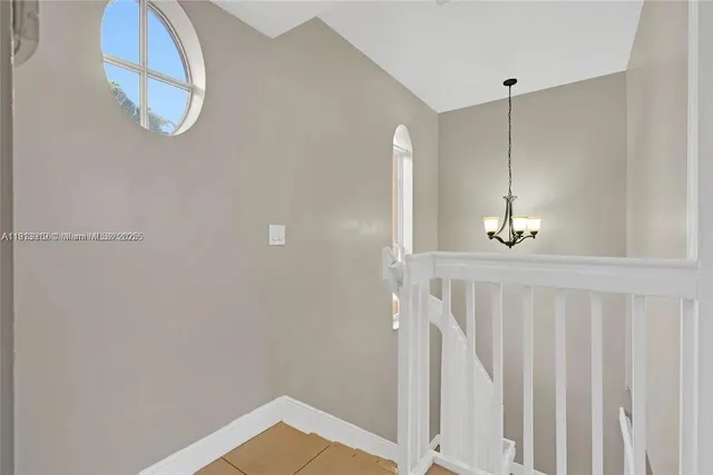 a view of a hallway with entryway