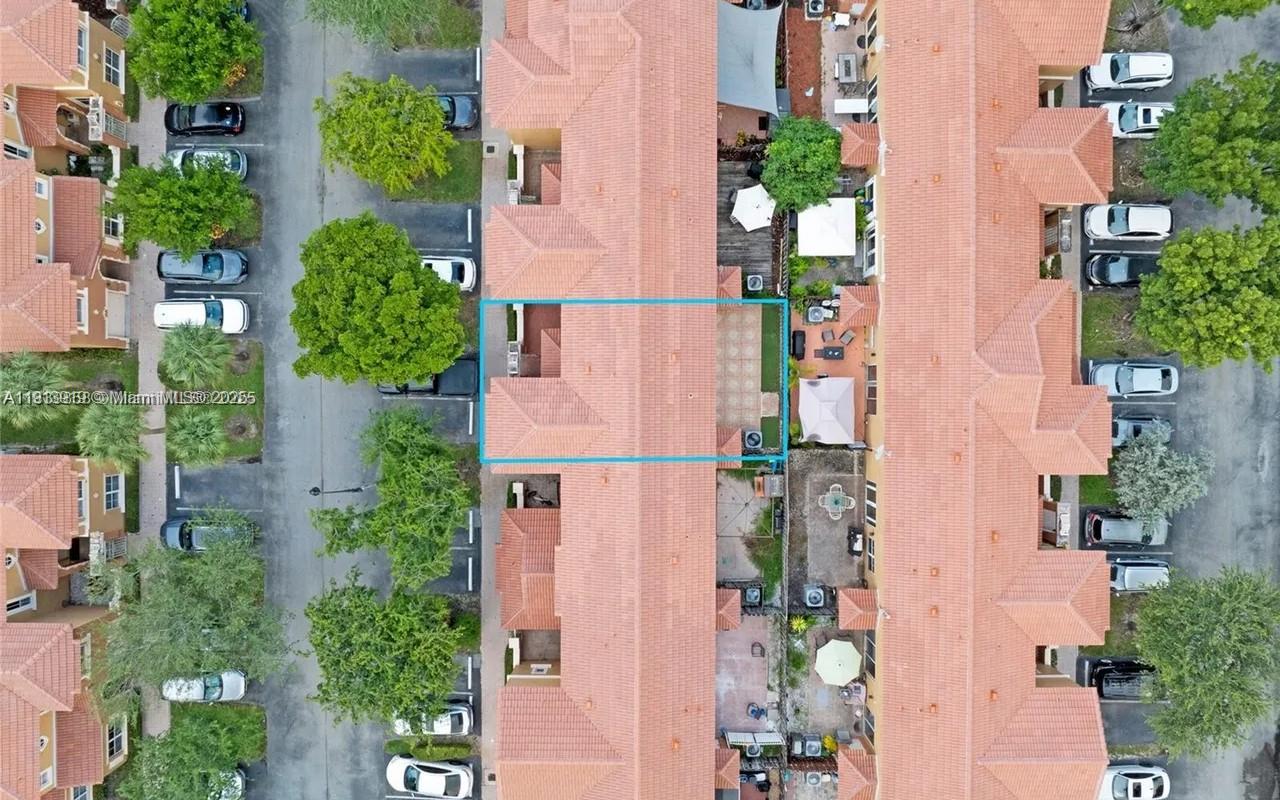 8422 Northwest 140th Terrace, Unit 3608 Miami Lakes, FL 33016 - Photo 19 of 23 an aerial view of residential houses with outdoor space and street view