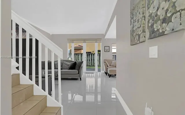 a living room with furniture and a couch