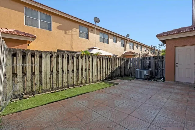 a front view of a house with garage