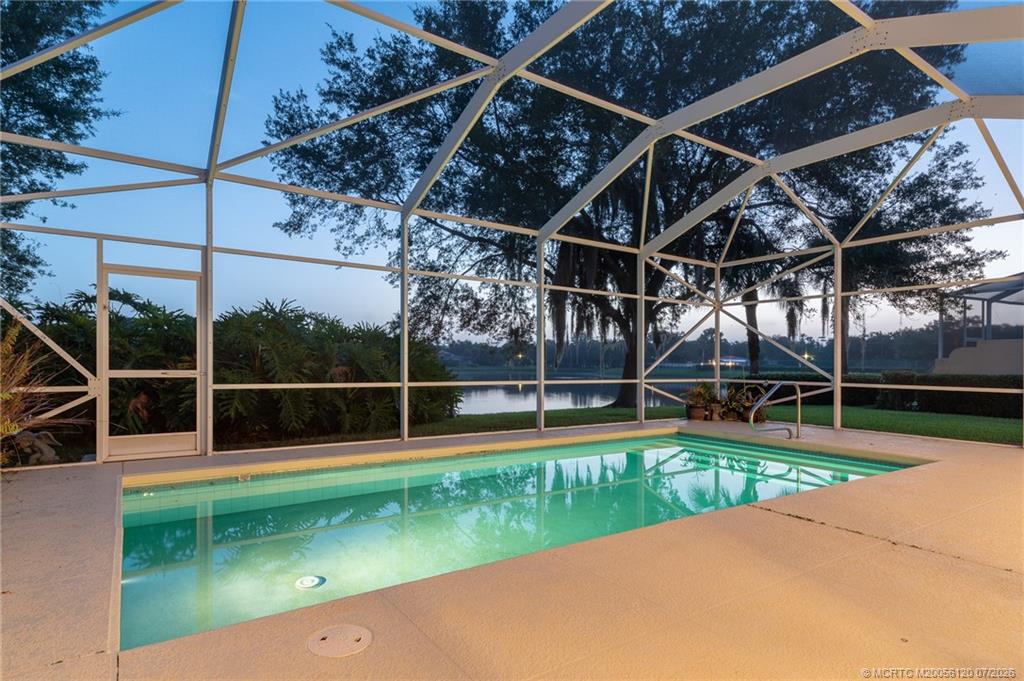 1313 Southwest Balmoral Trace Stuart, FL 34997 - Photo 7 of 70 Pool and patio before sunrise