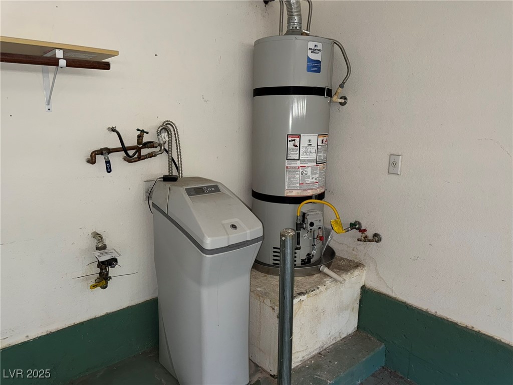 985 Prestwick Street Las Vegas, NV 89145 - Photo 20 of 27 Utility room featuring secured water heater