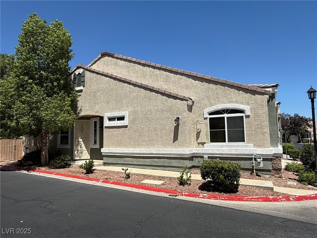 985 Prestwick Street Las Vegas, NV 89145 - Photo 27 of 27 View of front of house with stucco siding