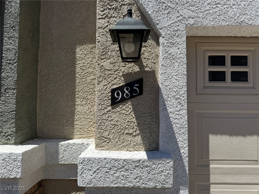 985 Prestwick Street Las Vegas, NV 89145 - Photo 4 of 27 Exterior view of stucco siding