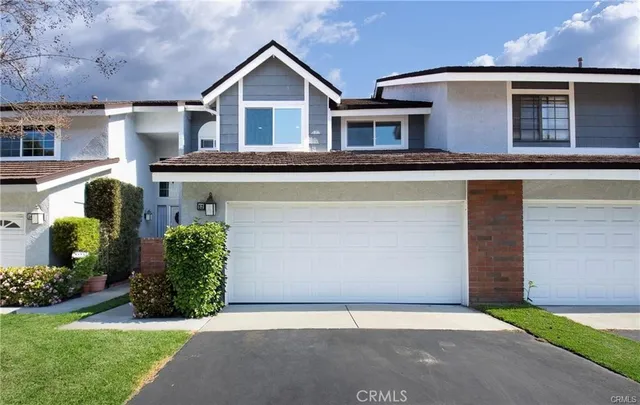 front view of a house with a street