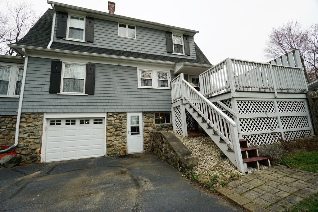 14 East Prospect Street Methuen, MA 01844 - Photo 12 of 42 a front view of a house with iron fence