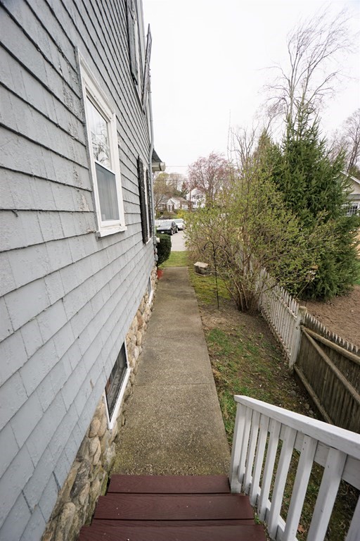 14 East Prospect Street Methuen, MA 01844 - Photo 15 of 42 a view of a wooden deck with trees