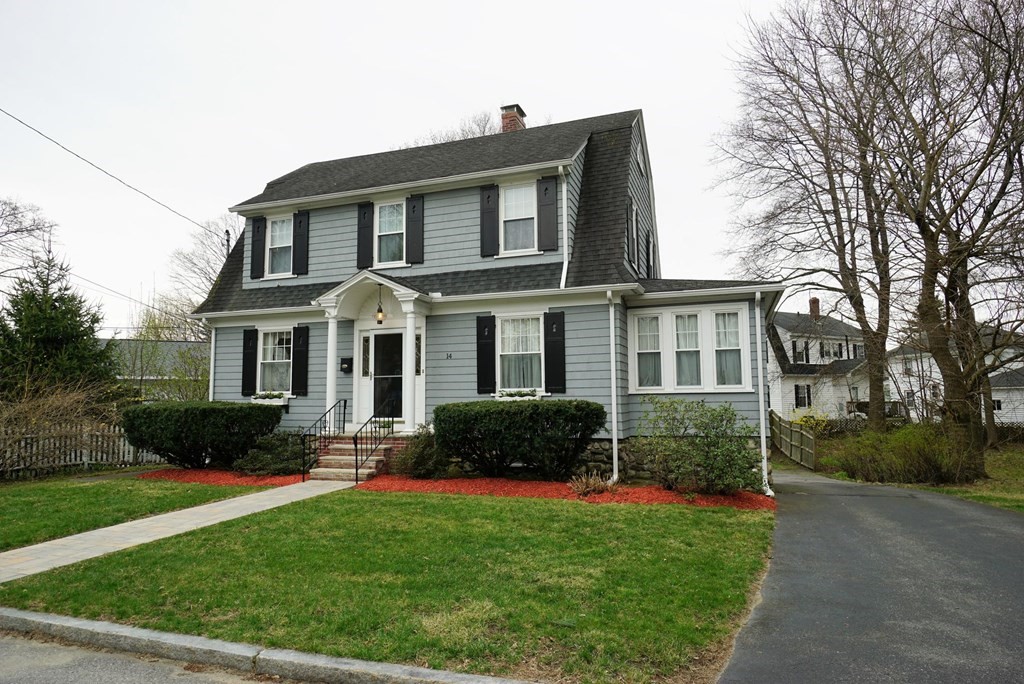 14 East Prospect Street Methuen, MA 01844 - Photo 2 of 42 a front view of a house with a yard