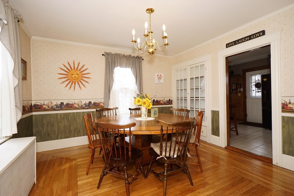 14 East Prospect Street Methuen, MA 01844 - Photo 23 of 42 a view of a dining room with furniture and chandelier
