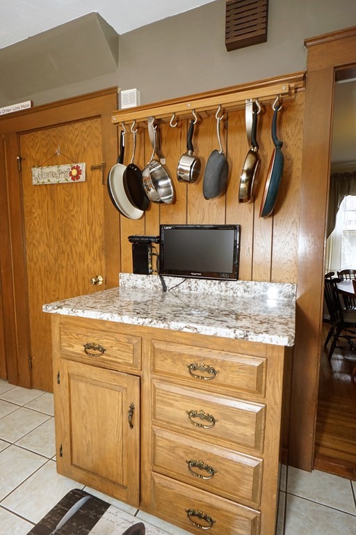 14 East Prospect Street Methuen, MA 01844 - Photo 27 of 42 a bathroom with a granite countertop sink and a mirror