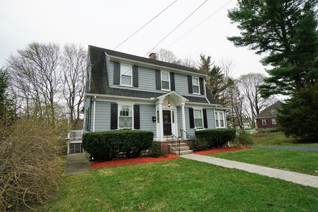 14 East Prospect Street Methuen, MA 01844 - Photo 3 of 42 a front view of house with yard and green space