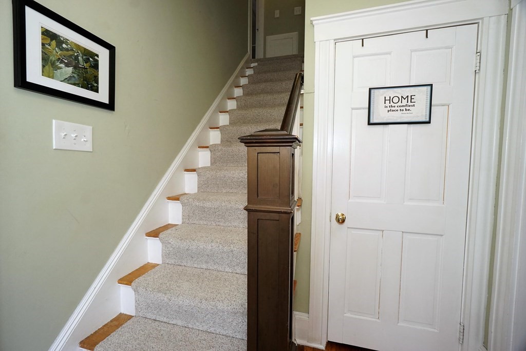 14 East Prospect Street Methuen, MA 01844 - Photo 33 of 42 a view of hallway with stairs and wooden floor