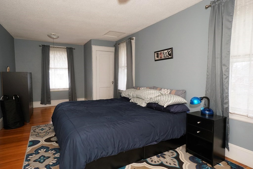 14 East Prospect Street Methuen, MA 01844 - Photo 38 of 42 a bedroom with a bed and a window