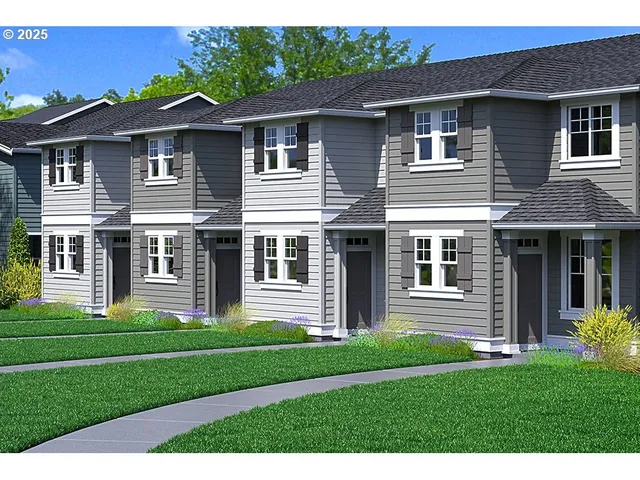 a front view of a house with a garden and porch