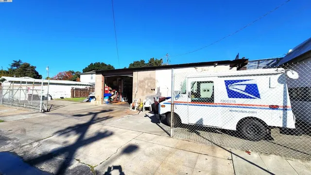 a car parked in front of garage