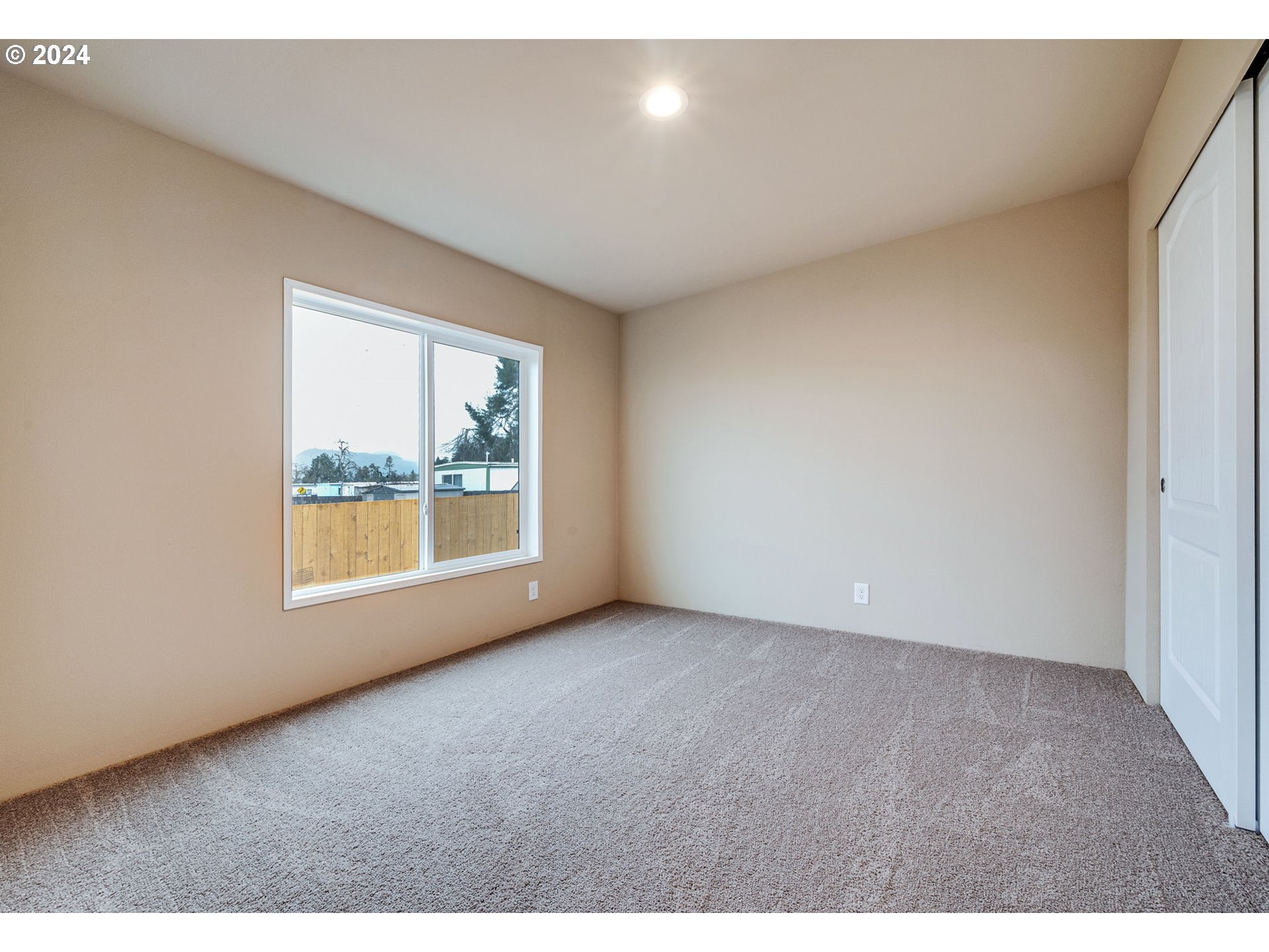 517 South 53rd Street Springfield, OR 97478 - Photo 26 of 44 a view of an empty room with a window