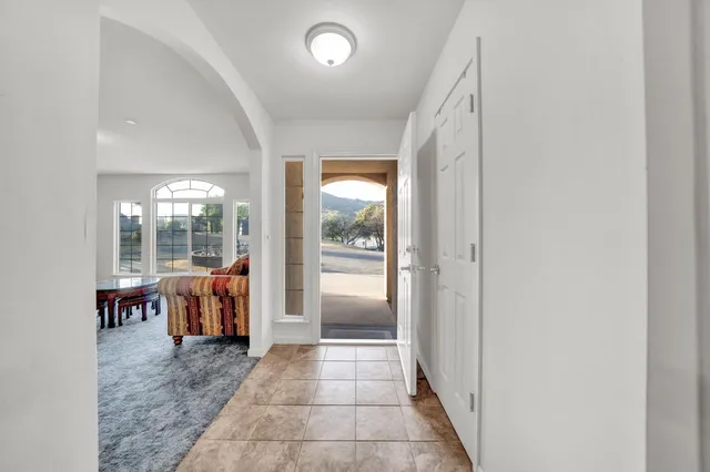 a kitchen with stainless steel appliances a stove a sink and a refrigerator