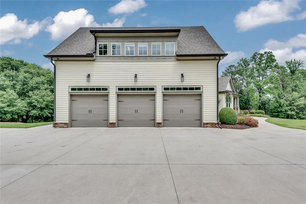 2503 Sugar Pike Road Canton, GA 30115 - Photo 43 of 134 front view of a house with a garage