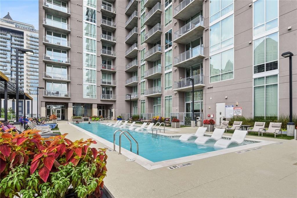 205 12th Street Northeast, Unit 3 Atlanta, GA 30309 - Photo 2 of 24 a building view with outdoor space