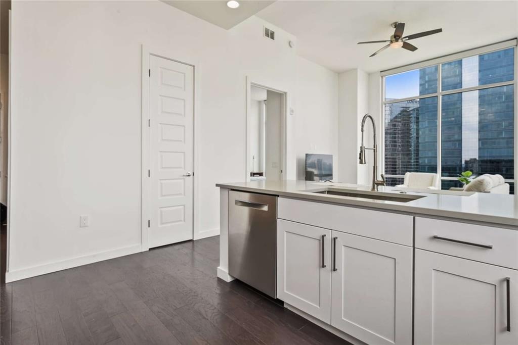 205 12th Street Northeast, Unit 3 Atlanta, GA 30309 - Photo 6 of 24 a bathroom with a double vanity sink and a mirror