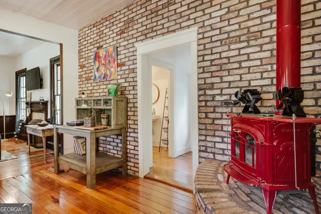 a kitchen with stainless steel appliances granite countertop a stove and a refrigerator