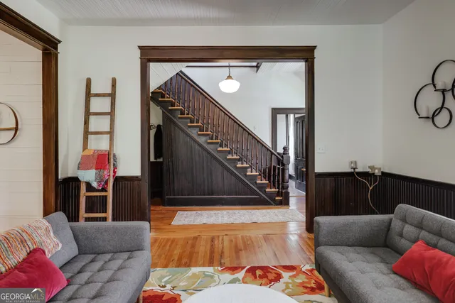 a kitchen with a sink a stove and cabinets