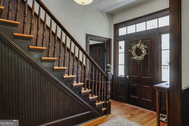 a view of a patio with table and chairs