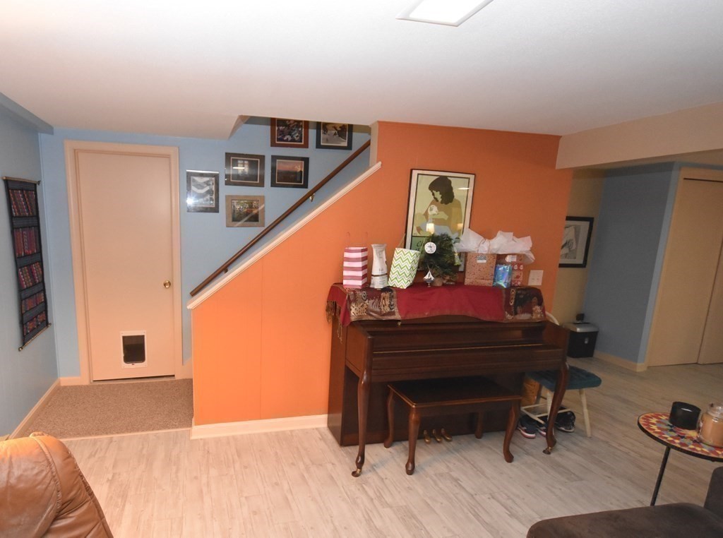32 Aubinwood Road Amherst, MA 01002 - Photo 31 of 42 a view of a hallway with workspace and wooden floor