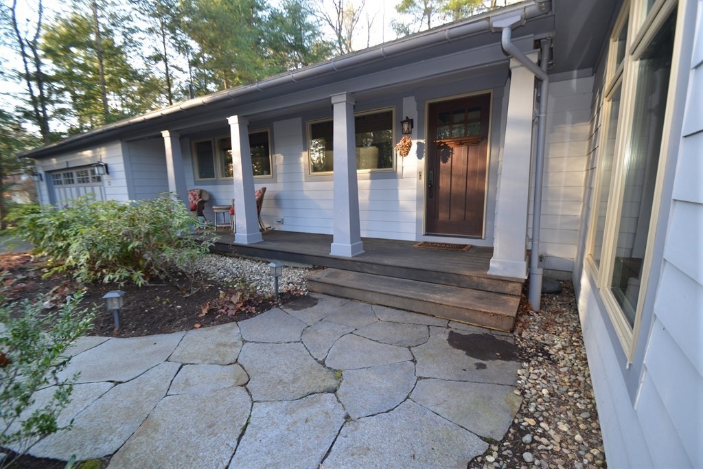32 Aubinwood Road Amherst, MA 01002 - Photo 4 of 42 a front view of a house with a yard