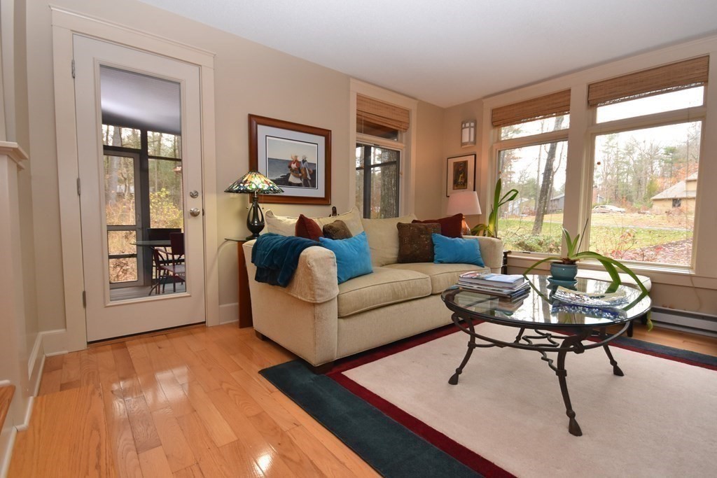 32 Aubinwood Road Amherst, MA 01002 - Photo 6 of 42 a living room with furniture and a large window