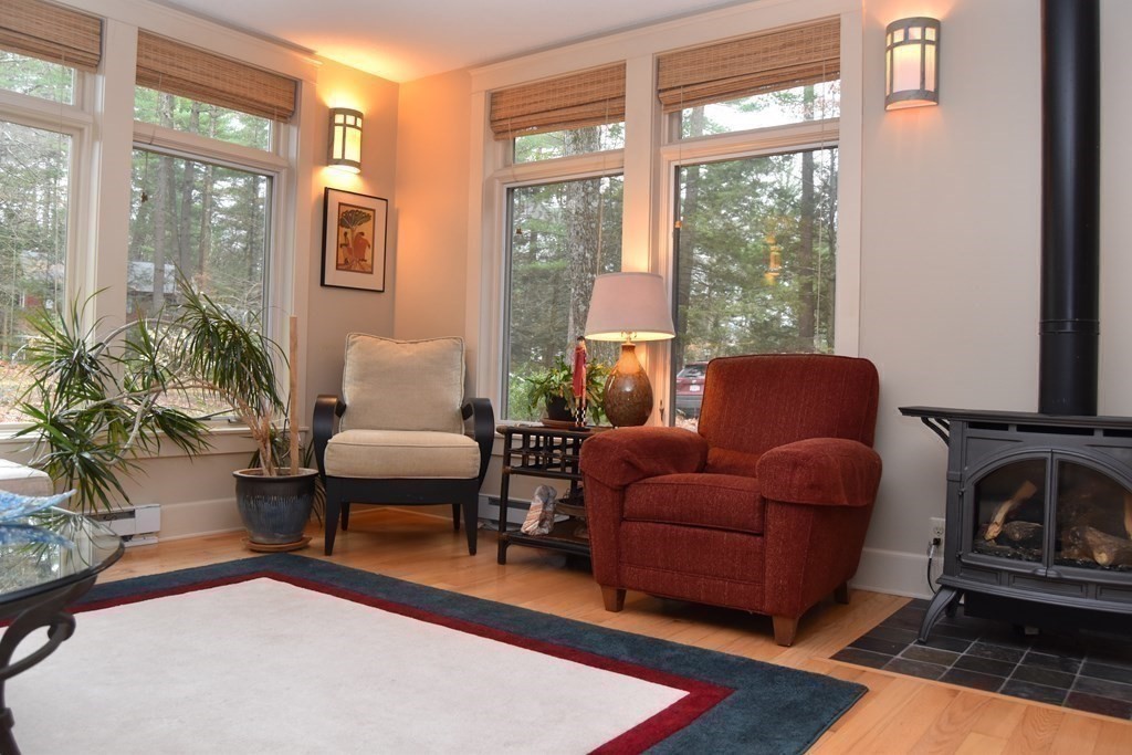 32 Aubinwood Road Amherst, MA 01002 - Photo 7 of 42 a living room with furniture and a window