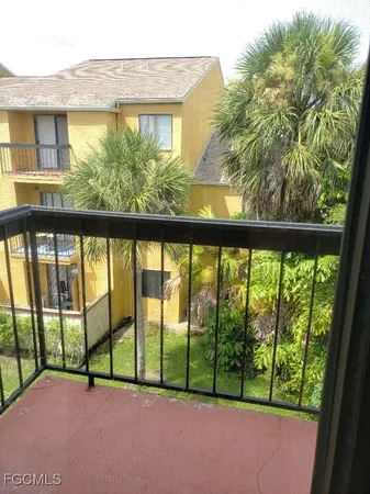a view of swimming pool with an outdoor seating