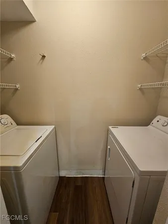 a bathroom with a sink and washing machine
