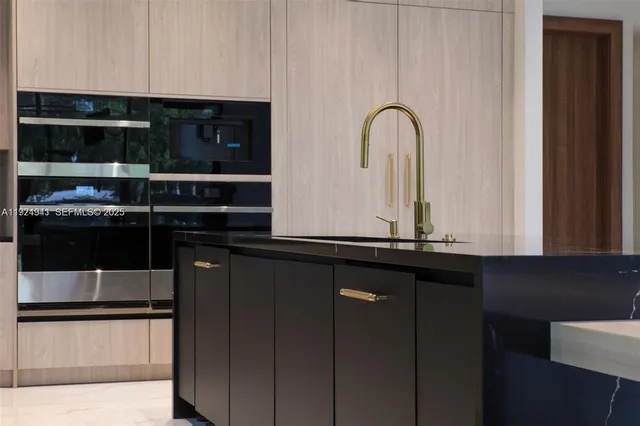 a bathroom with a tub shower sink and mirror