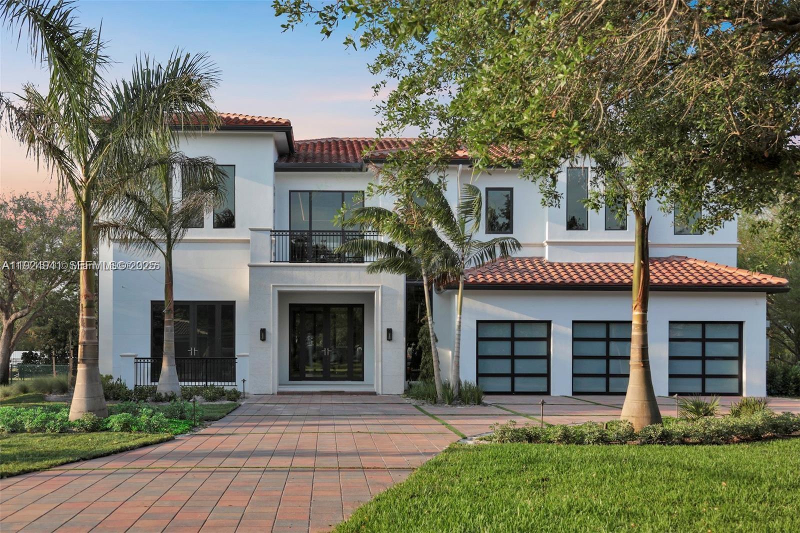 5903 Southwest 54th Court Davie, FL 33314 - Photo 2 of 47 front view of a house with a yard
