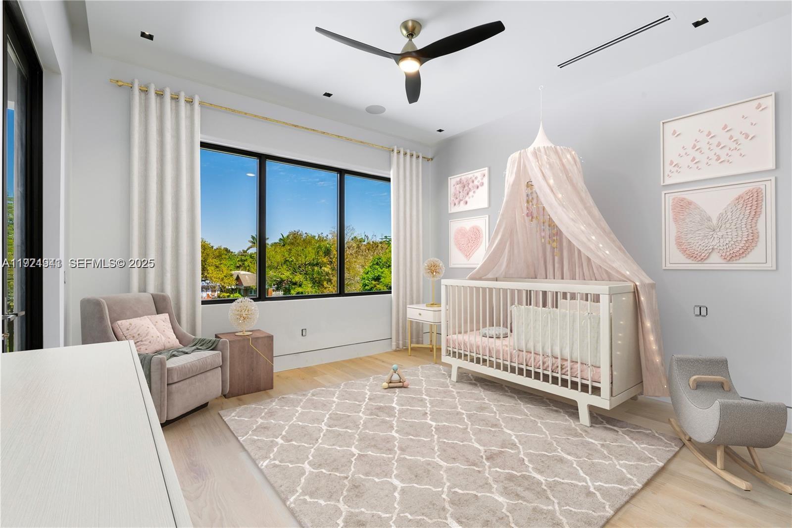 5903 Southwest 54th Court Davie, FL 33314 - Photo 29 of 47 a bedroom with furniture and a large window