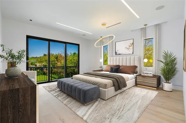 a view of a house with swimming pool and a large window