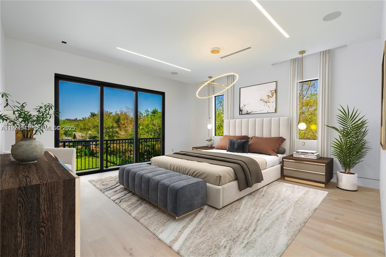 5903 Southwest 54th Court Davie, FL 33314 - Photo 34 of 47 a bedroom with a bed and a large window