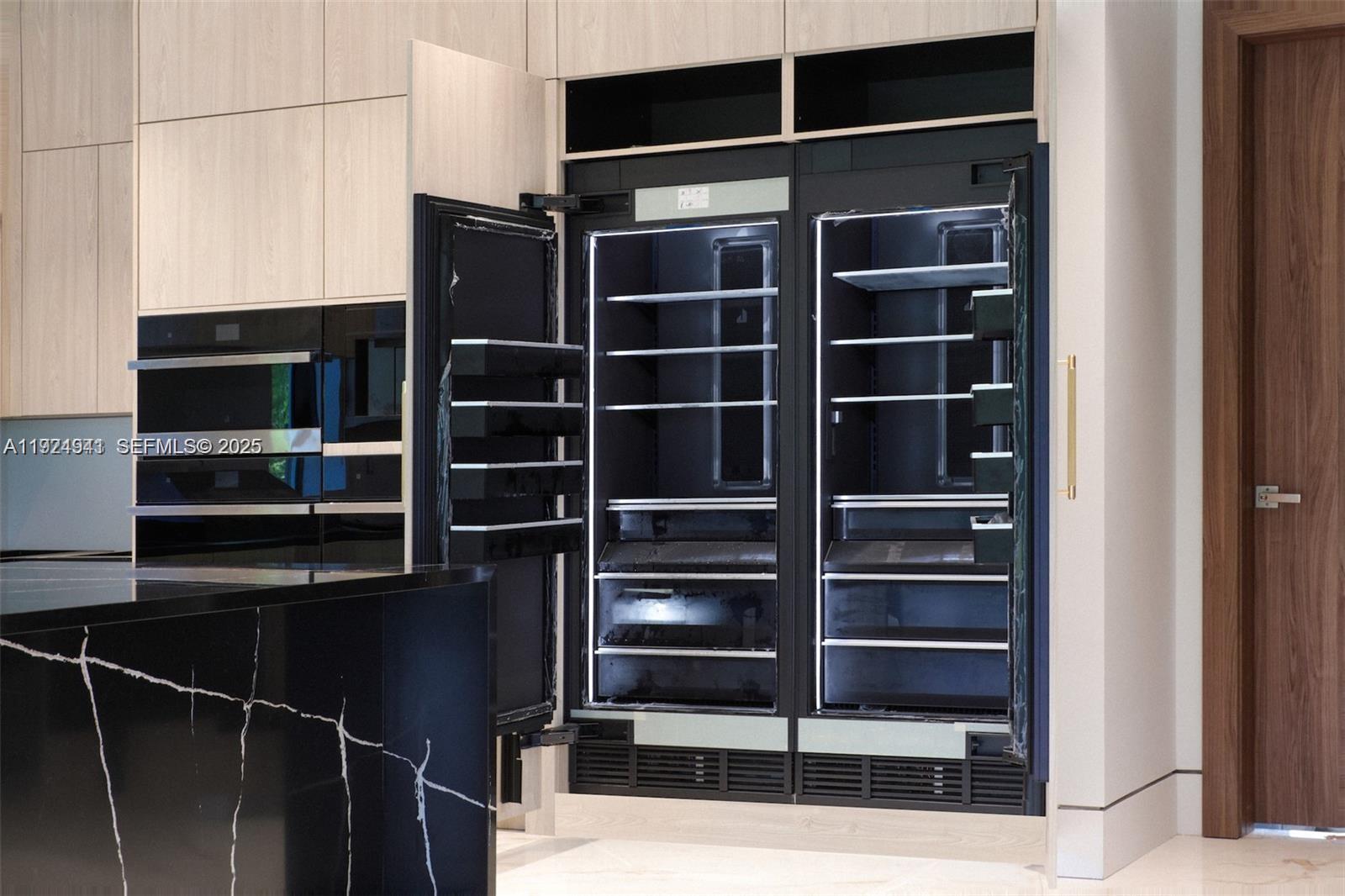 5903 Southwest 54th Court Davie, FL 33314 - Photo 9 of 47 a view of walk in closet with empty racks