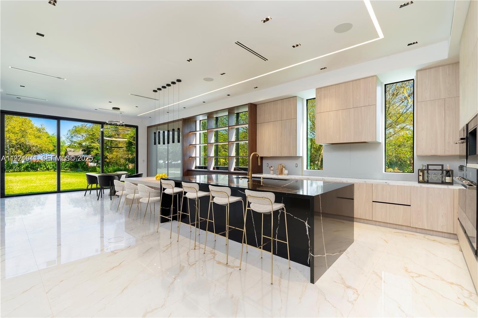5903 Southwest 54th Court Davie, FL 33314 - Photo 10 of 47 a view of a kitchen and dining room