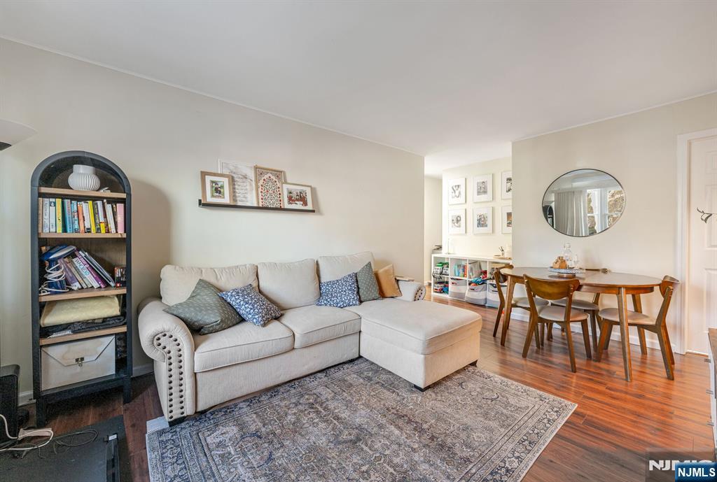 16-08 Plaza Road, Unit B Fair Lawn, NJ 07410 - Photo 6 of 16 a living room with furniture and wooden floor