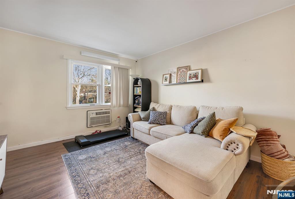 16-08 Plaza Road, Unit B Fair Lawn, NJ 07410 - Photo 7 of 16 a living room with furniture and a window