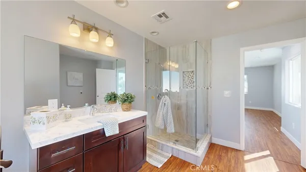 a view of a house with basketball court