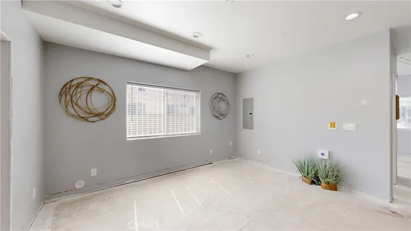 an empty room with windows