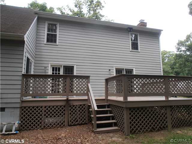 4901 Rollingway Road Chesterfield, VA 23832 - Photo 12 of 14 a front view of a house with wooden fence