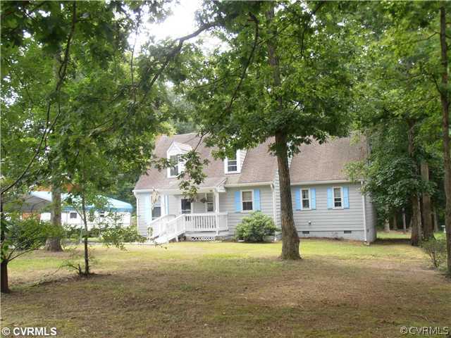 4901 Rollingway Road Chesterfield, VA 23832 - Photo 2 of 14 a front view of a house with a yard