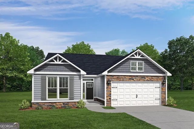 front view of a house with a yard