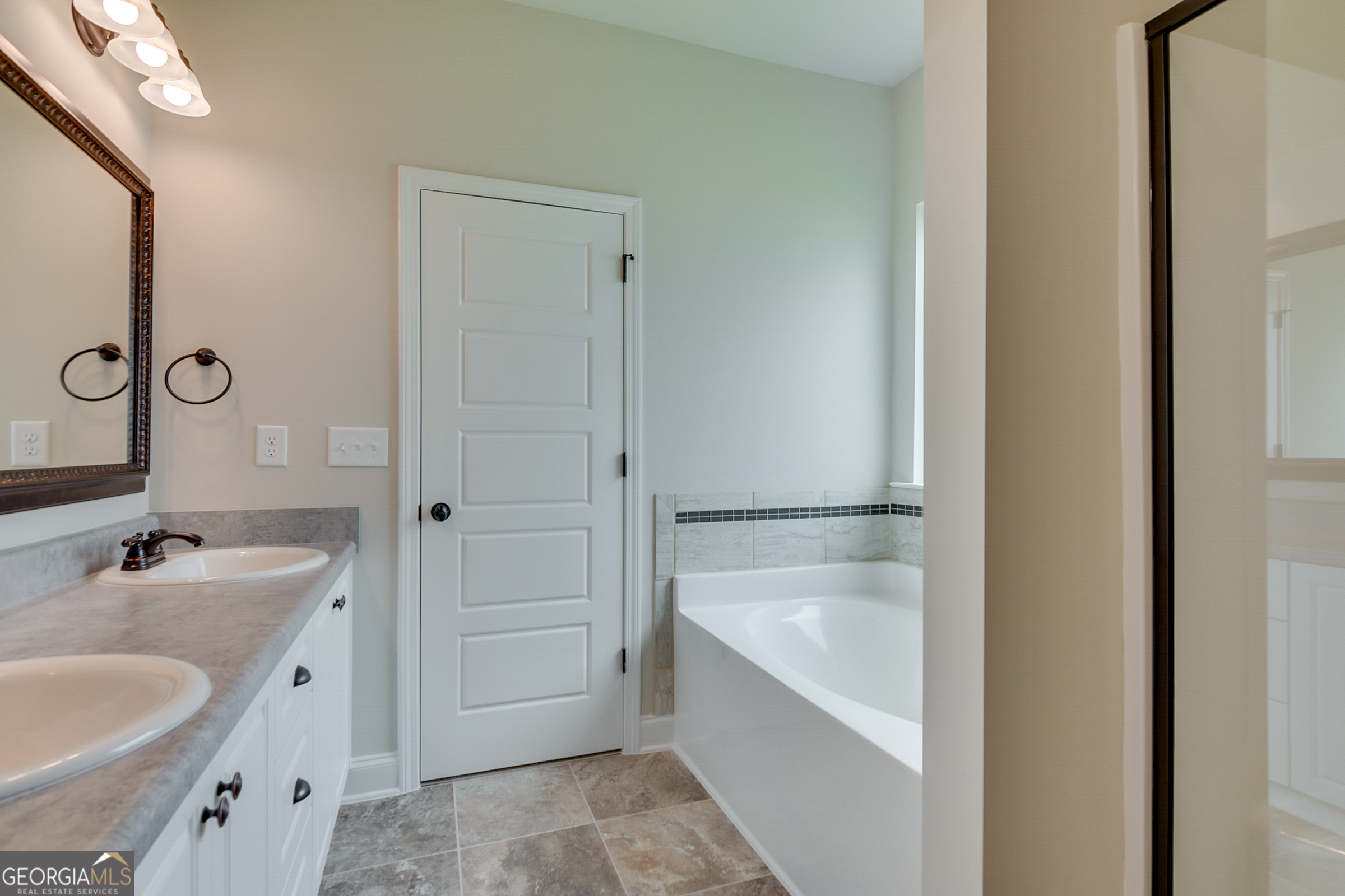 0 Orchard Circle Edgefield, SC 29824 - Photo 5 of 10 a bathroom with a tub sink and mirror